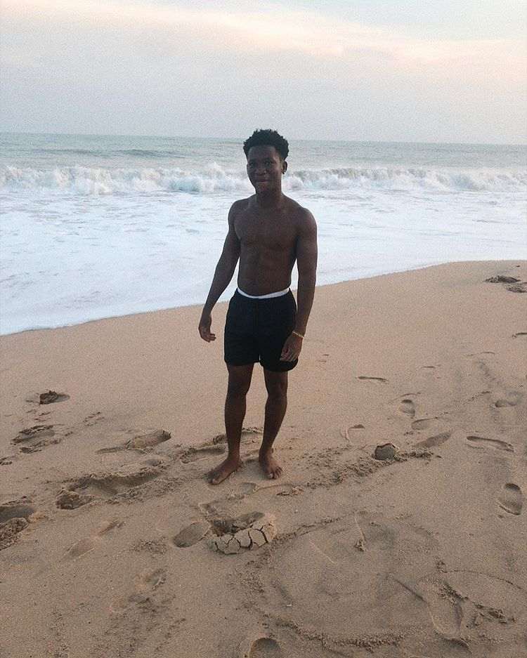 Abraham Attah pose at the beach in Ghana 