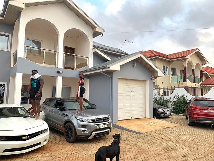 Fella makafui and Medikal pose in her Mansion 