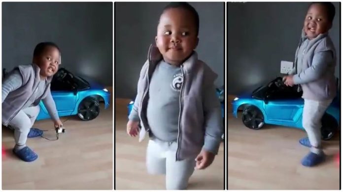 toddler insists on charging his toy car without electricity