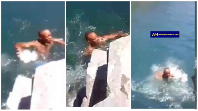 Little Boy helplessly watches his dad to drown