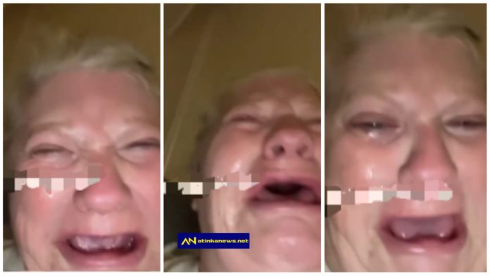 White woman breaks down in tears
