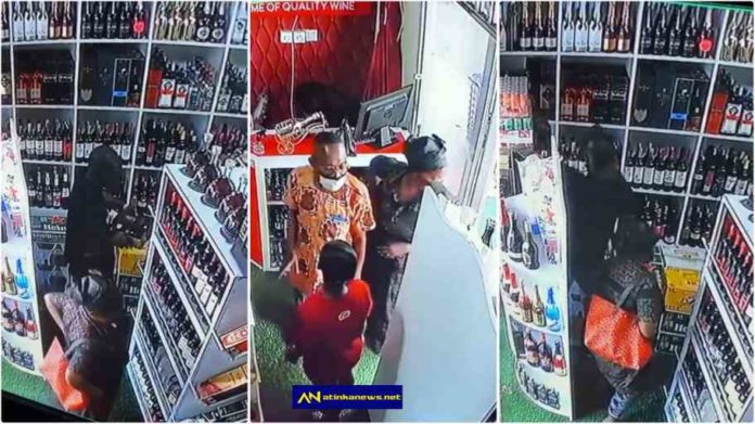 Mother and son caught on camera stealing drinks from a liquor store at Tema