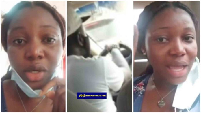 Lady cries for help as car conveying her refuses to stop