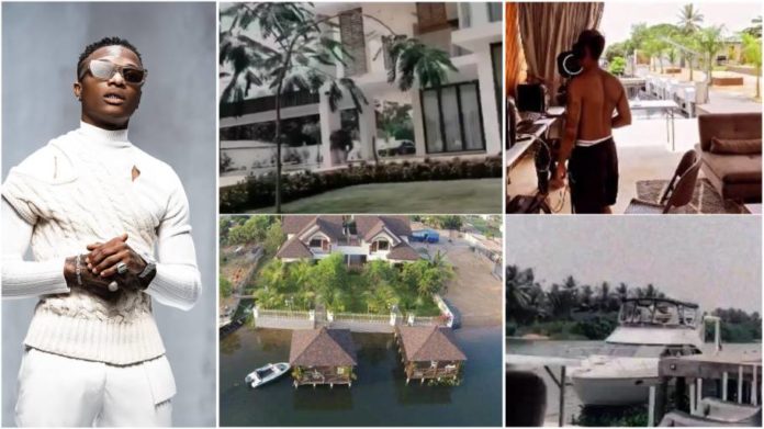 Wizkid flaunts powerful riverside mansion, yacht and studio in Ghana