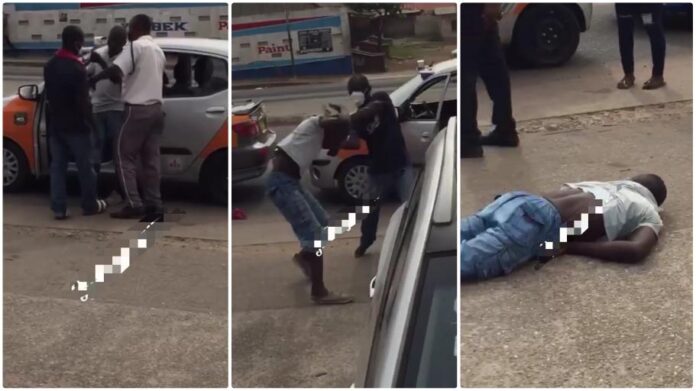 Taxi driver collapses after a brawl with another driver on the street