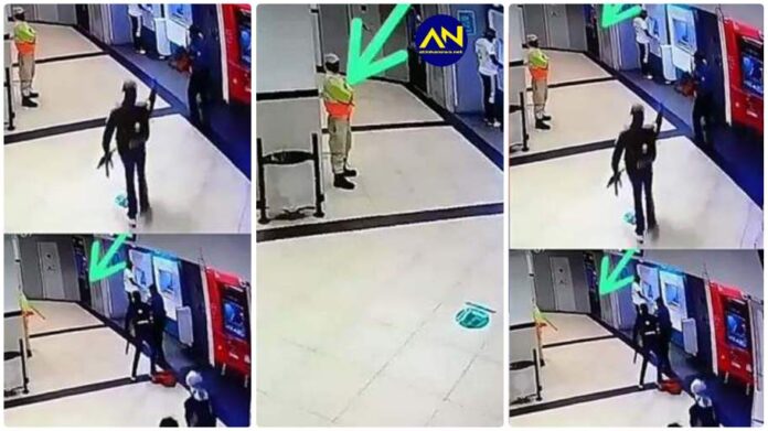 security guard hiding behind a pillar as heavily armed robbers pounced a local ATM