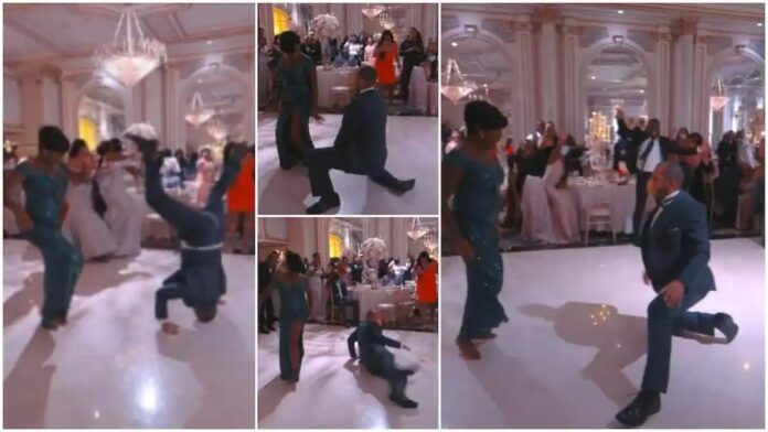 Man almost breaks his neck with powerful dance moves at a wedding