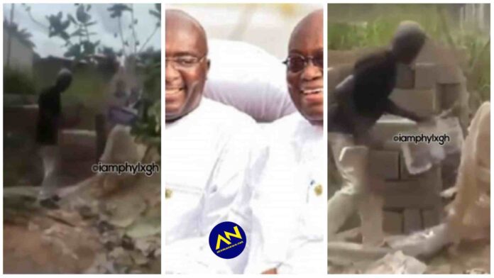Angry man spotted ‘whipping’ Akufo Addo and Bawumia’s poster
