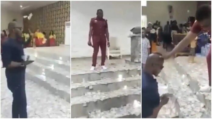 man sprays pastor with wads of cash during church service