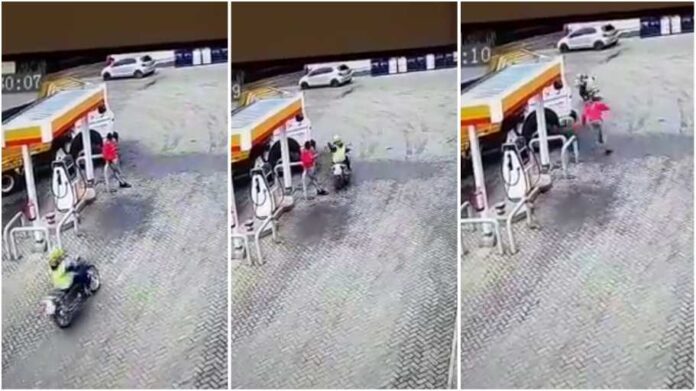 Okada rider caught on camera snatching man’s mobile phone in a filling station