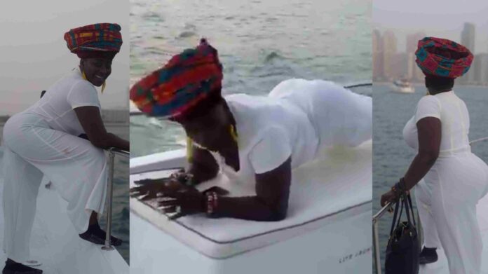 Akumaa Mama Zimbi cause stir as she whines her waist on a boat