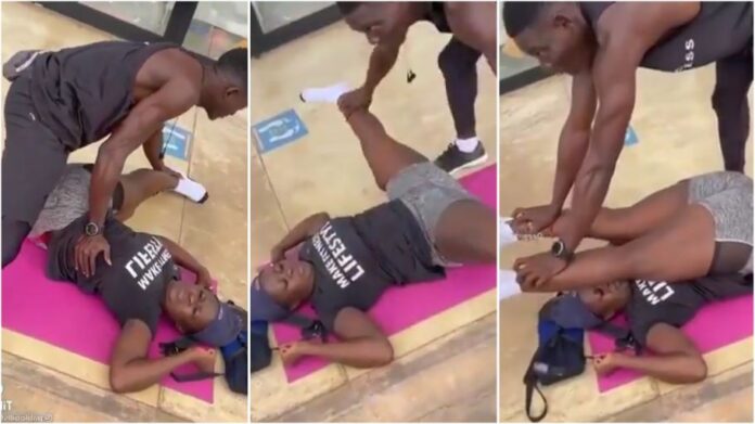 Another gym instructor seen in a compromising posture with hot lady in a gym