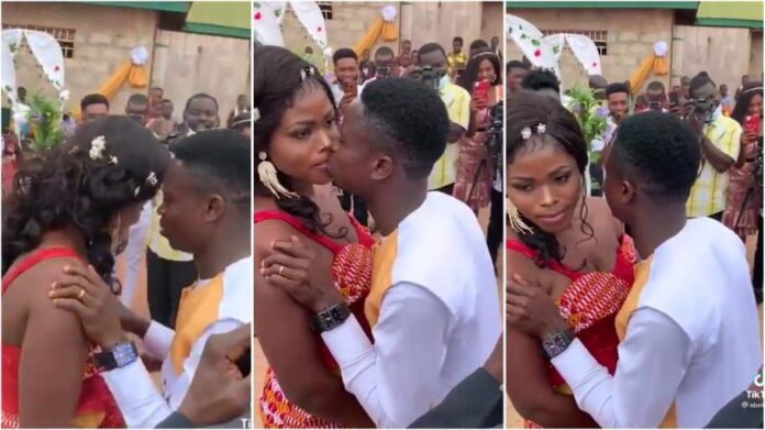 bride embarrassing the groom during their wedding ceremony after she refused to kiss him