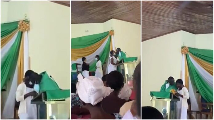 Reverend Father kissing three students in Ghana