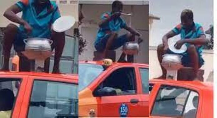 young man cooking on top of a moving taxi