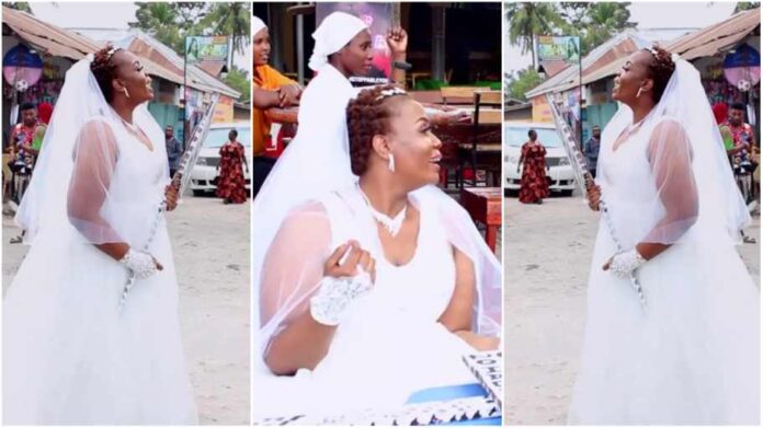 Lady says as she hits street in wedding gown to look for a husband