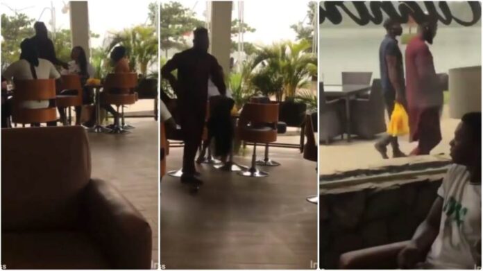 Man snatches a wig and shoes he bought for his girlfriend after he saw her with another man in a restaurant