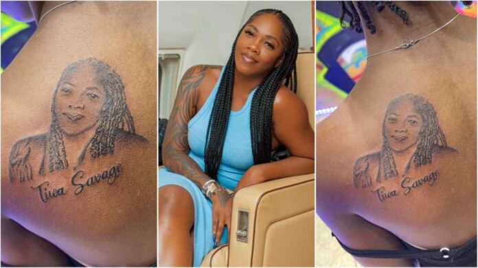 Die-hard fan gets tattoo of Tiwa Savage’s face on her body