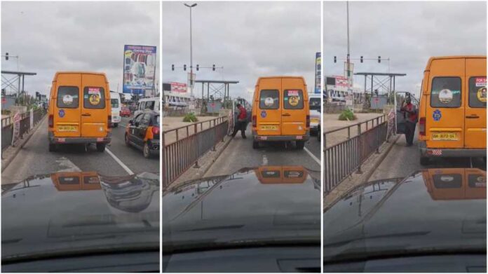 Trouble looms as Trotro driver caught urinating in the middle of the road [Watch]
