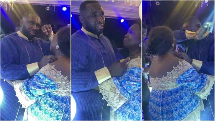 Groom cries like a baby at his wedding during Mother and son dance