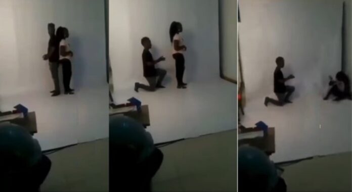 Lady instantly falls down in shock as her man surprises her by proposing during photoshoot