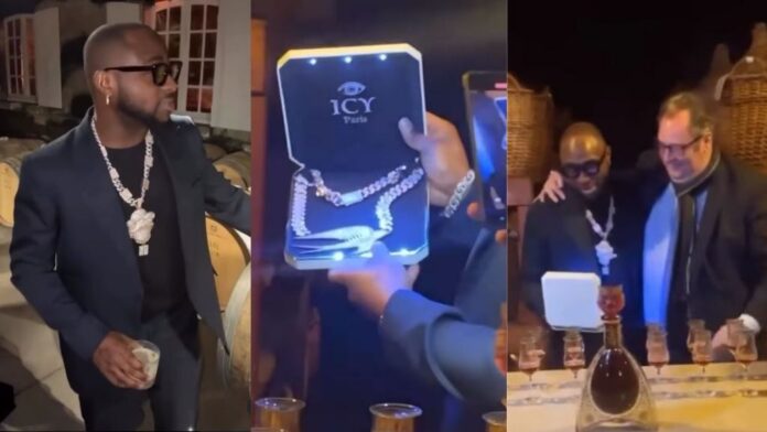 Davido receives millions of naira worth diamond necklace, and a barrel of whiskey from Martell Cognac