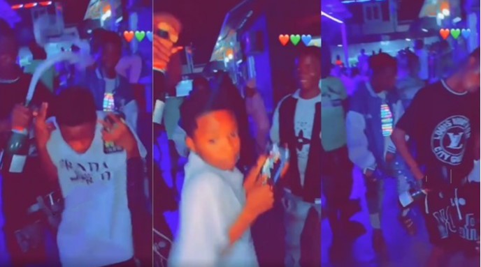 video of underage boys popping bottle and partying hard at night