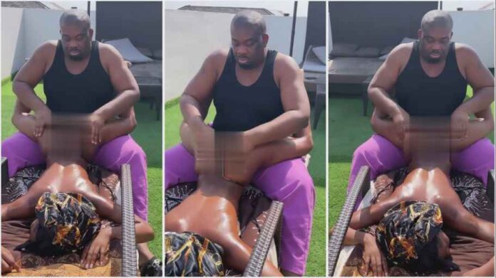Don Jazzy gives lady massage