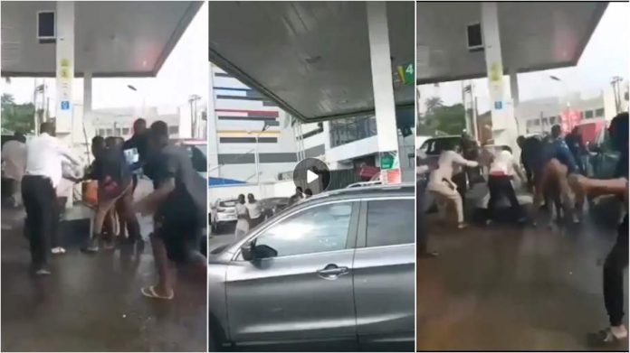 woman hijacks fuel pump and sprays petrol on customers at petrol station
